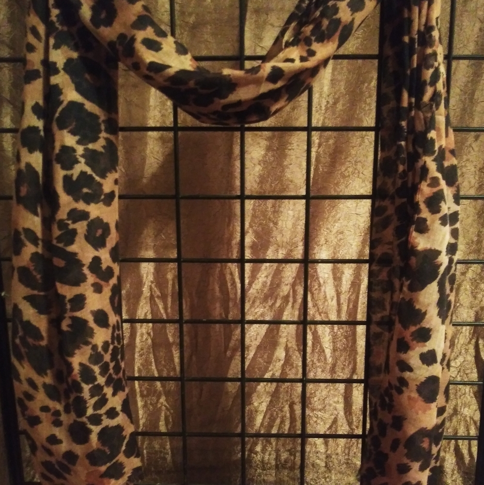 Leopard print scarf with fringe on edges